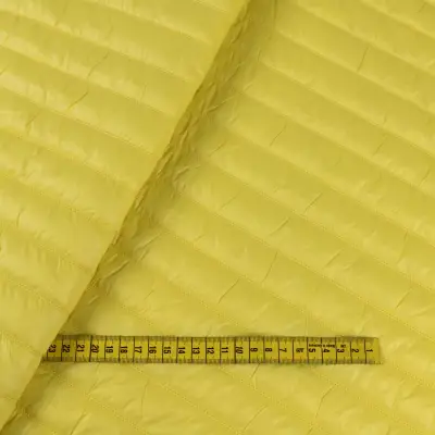 Tkanina pikowaną z ociepliną kolor żółty 