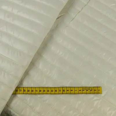 Tkanina pikowaną z ociepliną kolor pastelowy żółty 