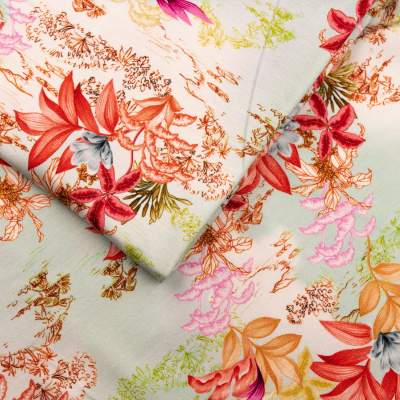 Dzianina bawełniana GOTS wzór kwiaty na miętowym tle