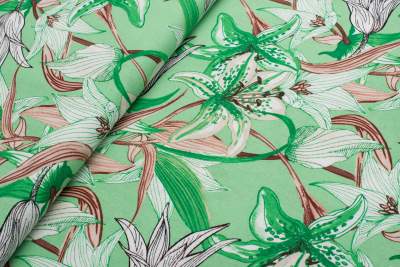 Len z wiskozą białe lilie na zielonym tle