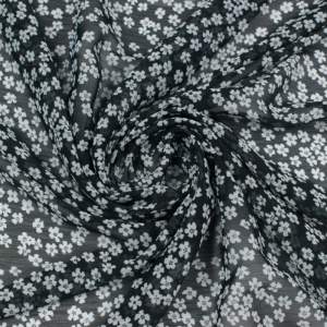 Tkanina szyfon kreszowany wzór łączka kwiatowa białe na czarnym tle