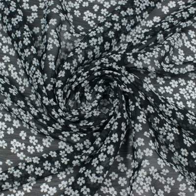Tkanina szyfon kreszowany wzór łączka kwiatowa białe na czarnym tle