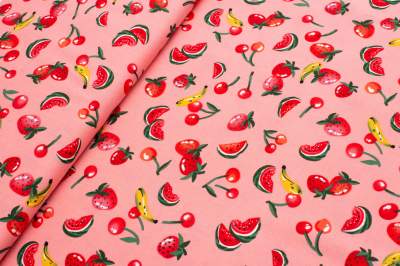 Tkanina wiskoza owoce na brzoskwiniowym tle