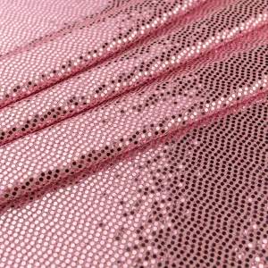 Dzianina na sukienki wzór błyszczące groszki kolor łososiowy