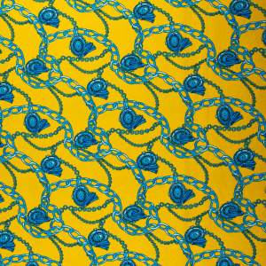 Tkanina Barbie wzór łańcuszki kolor żółty