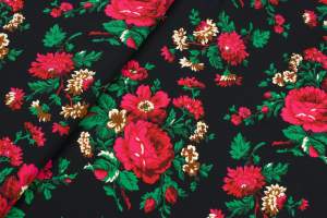 Tkanina krepa wzór ludowy na czarnym tle