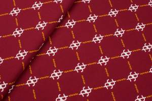 Tkanina silki wzór geometryczny na bordowym tle