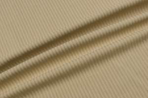 Materiały tapicerskie kolor beżowy, paski