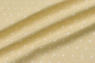 Materiały tapicerskie kolor wzór kwadraciki beżowy