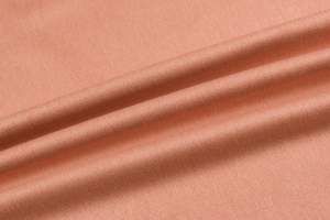 Materiały tapicerskie kolor łososiowy