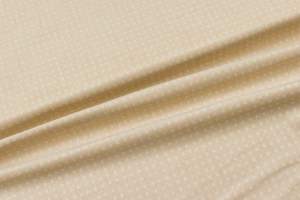 Materiały tapicerskie wzór geometryczny kolor beżowy