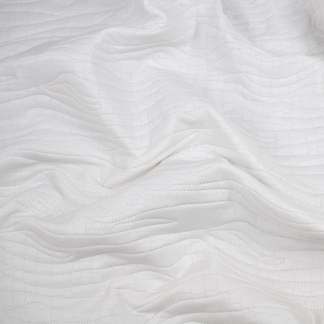 Tkanina pikowaną z ociepliną wzór skóra węża kolor kremowy