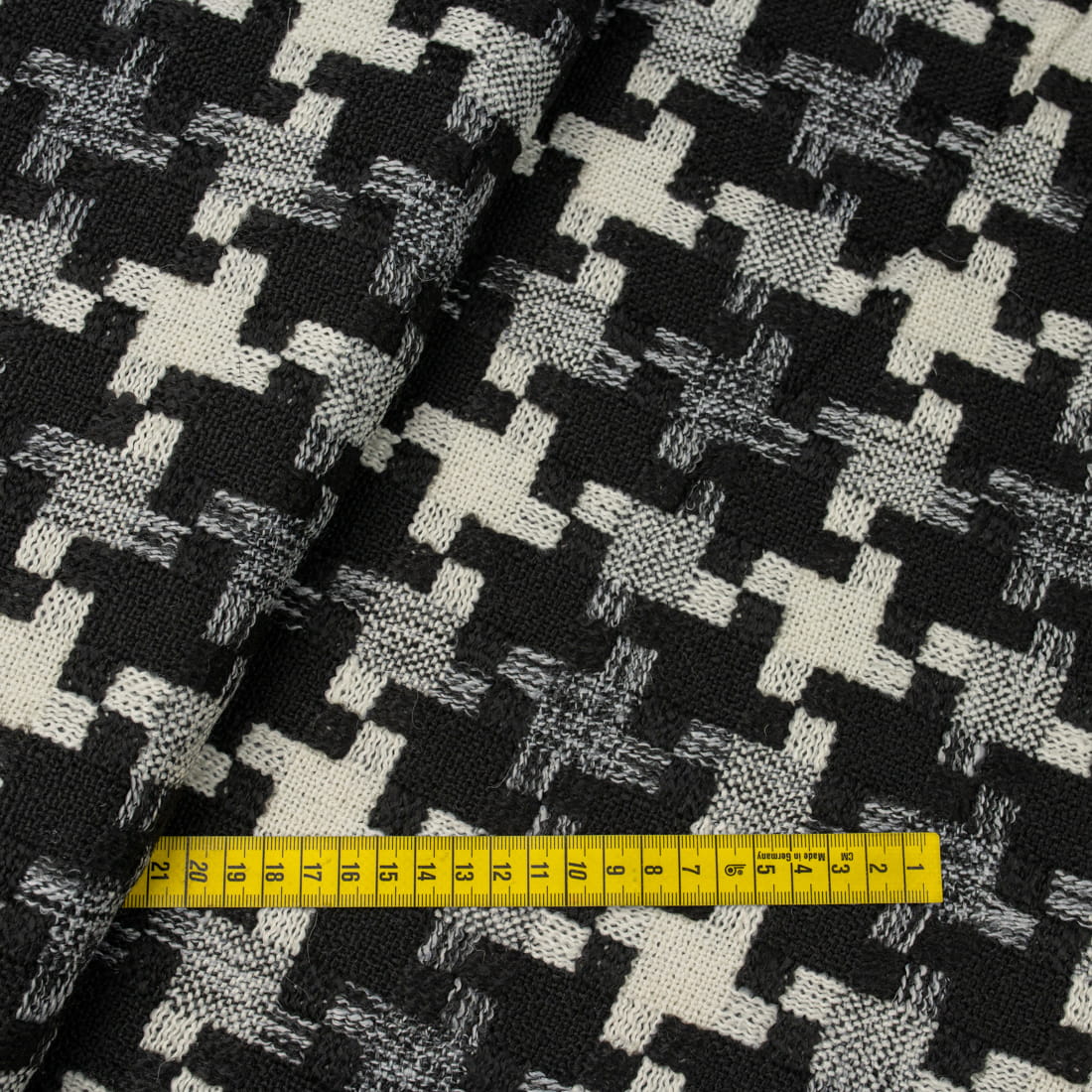 Tkanina płaszczowa wzór geometryczny czarny i kremowy