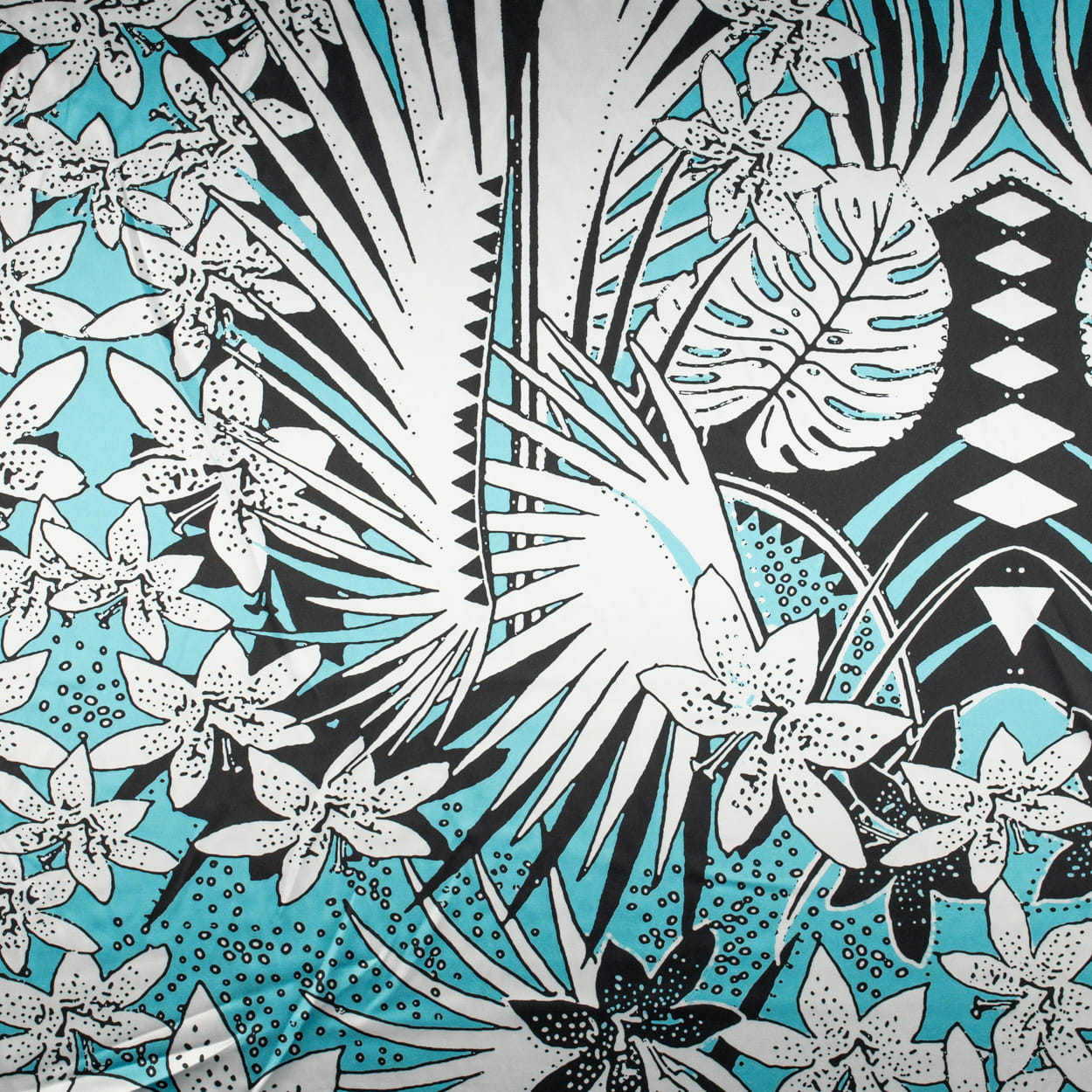 Tkanina Satyna lycra typu Cavalli tropikalne kwiaty niebieska