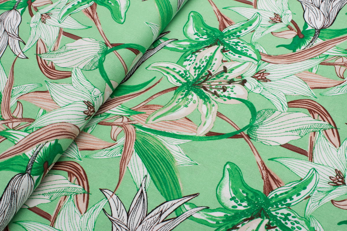 Len z wiskozą białe lilie na zielonym tle