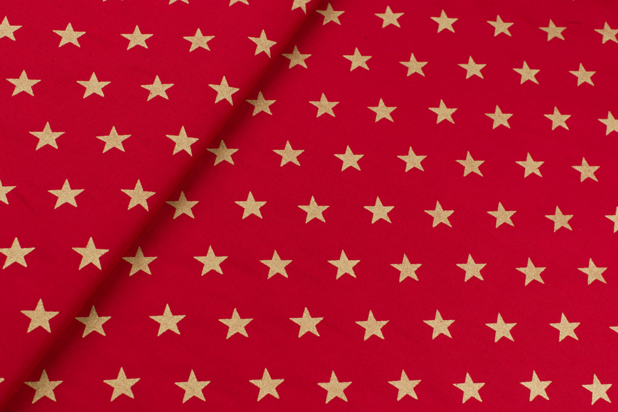 Tkanina popelina wzór gwiazdki na czerwonym tle